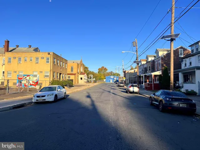 a view of a street in front of a building