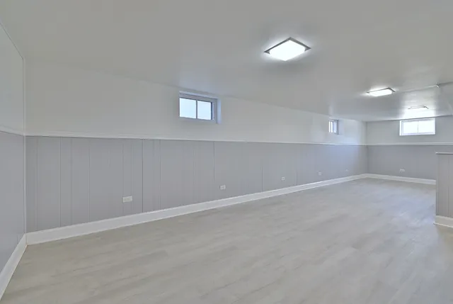 an empty room with a empty space and window