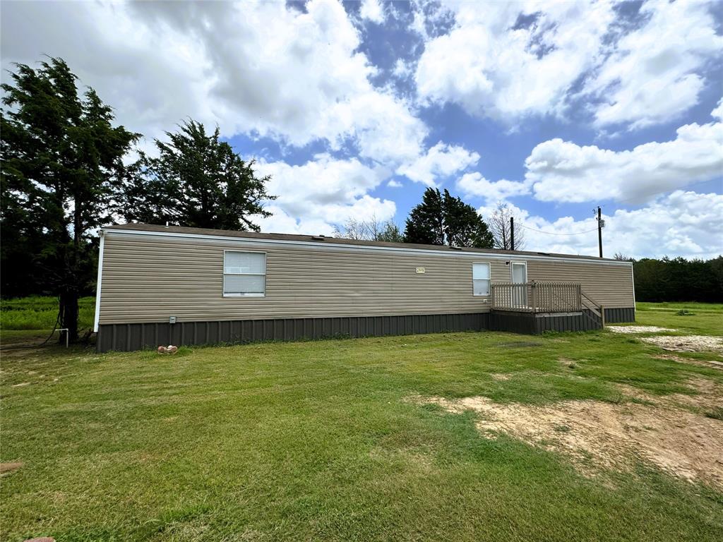 2087 Meadow Road Kerens, TX 75144 - Photo 2 of 28 a view of a backyard