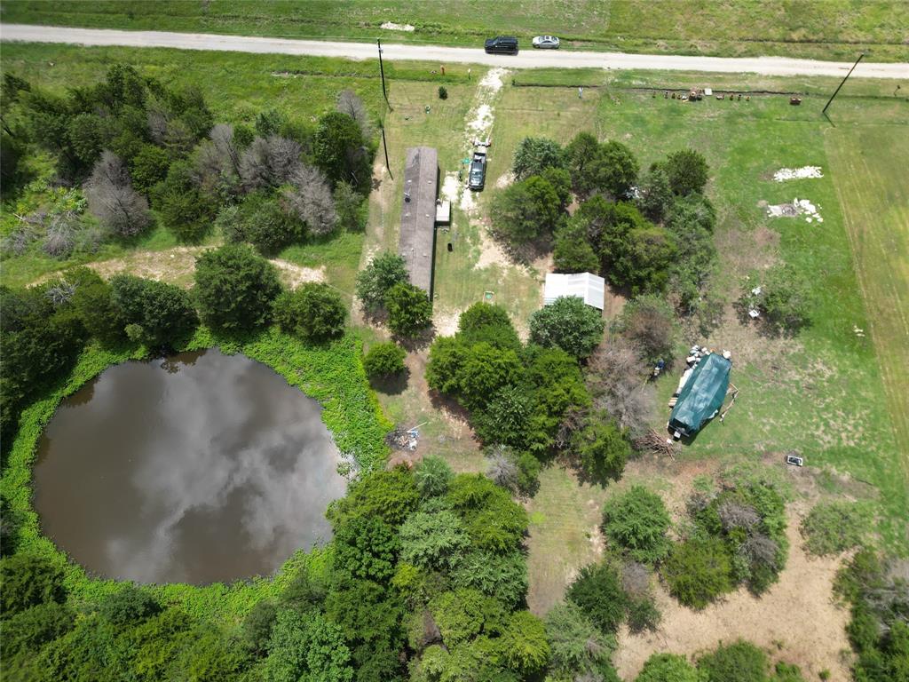 2087 Meadow Road Kerens, TX 75144 - Photo 27 of 28 an aerial view of a houses with yard