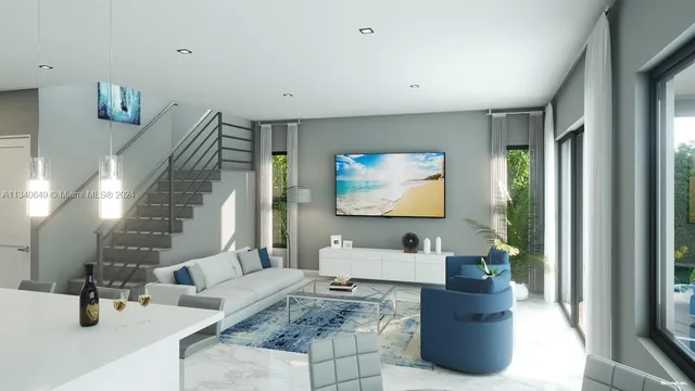 a living room with furniture and a flat screen tv