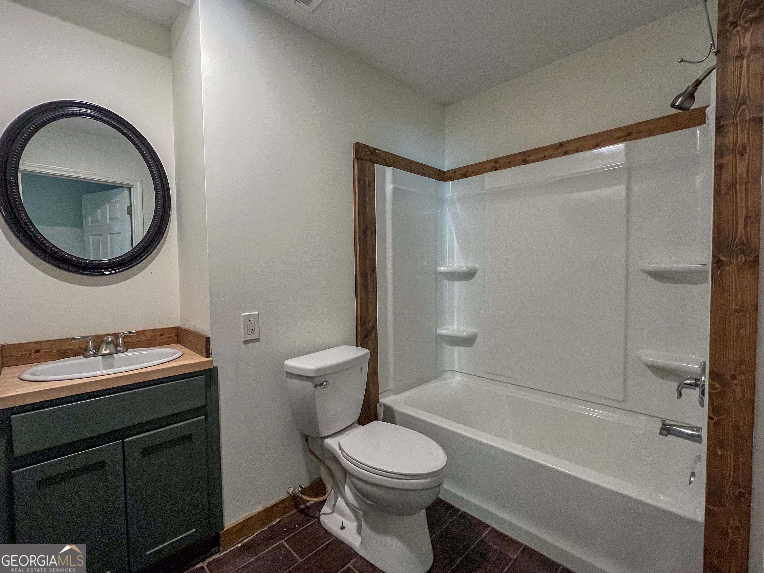 508 Denham Road East Dublin, GA 31027 - Photo 26 of 41 Laundry Space is in this guest bathroom