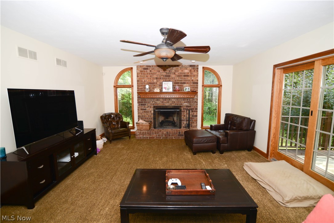 7581 South Raccoon Road Canfield, OH 44406 - Photo 16 of 34 Family room with fireplace
