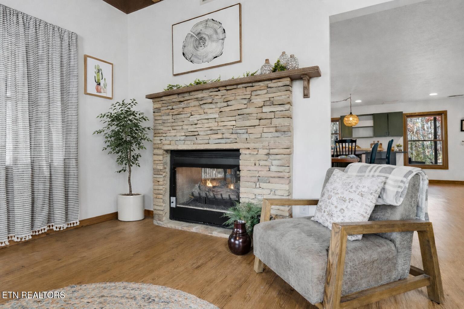 2489 Upper Middle Creek Road Sevierville, TN 37876 - Photo 8 of 57 Cozy living room with stone fireplace (1
