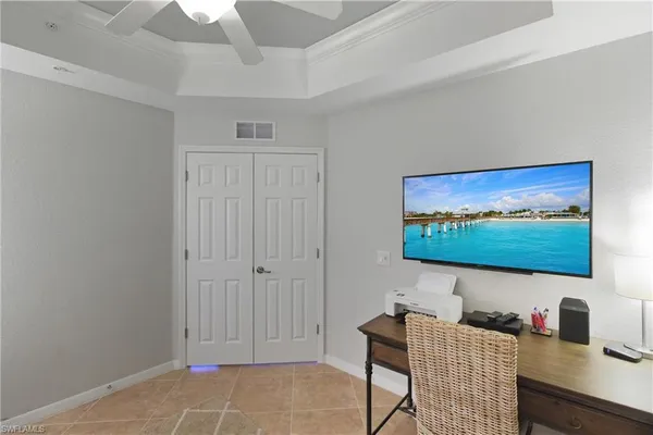 a room with furniture and screen