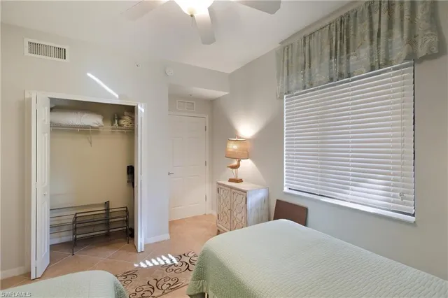 a bedroom with a bed and a view living room