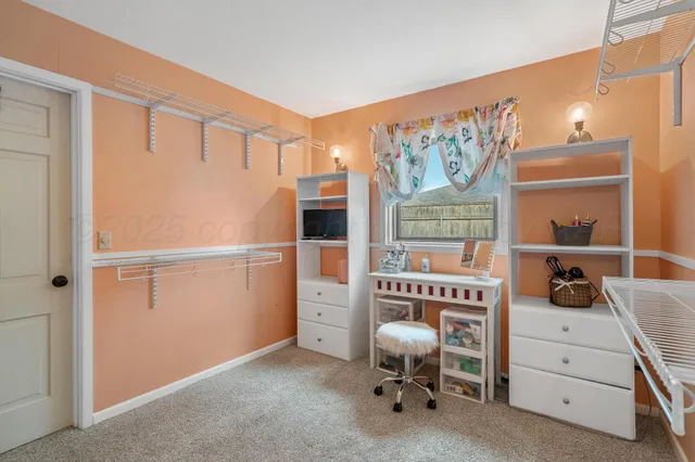 a room with a bed and a window