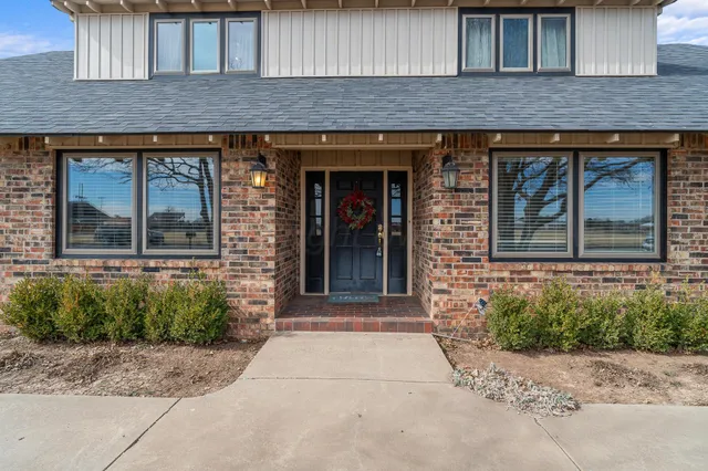 a front view of a house having yard
