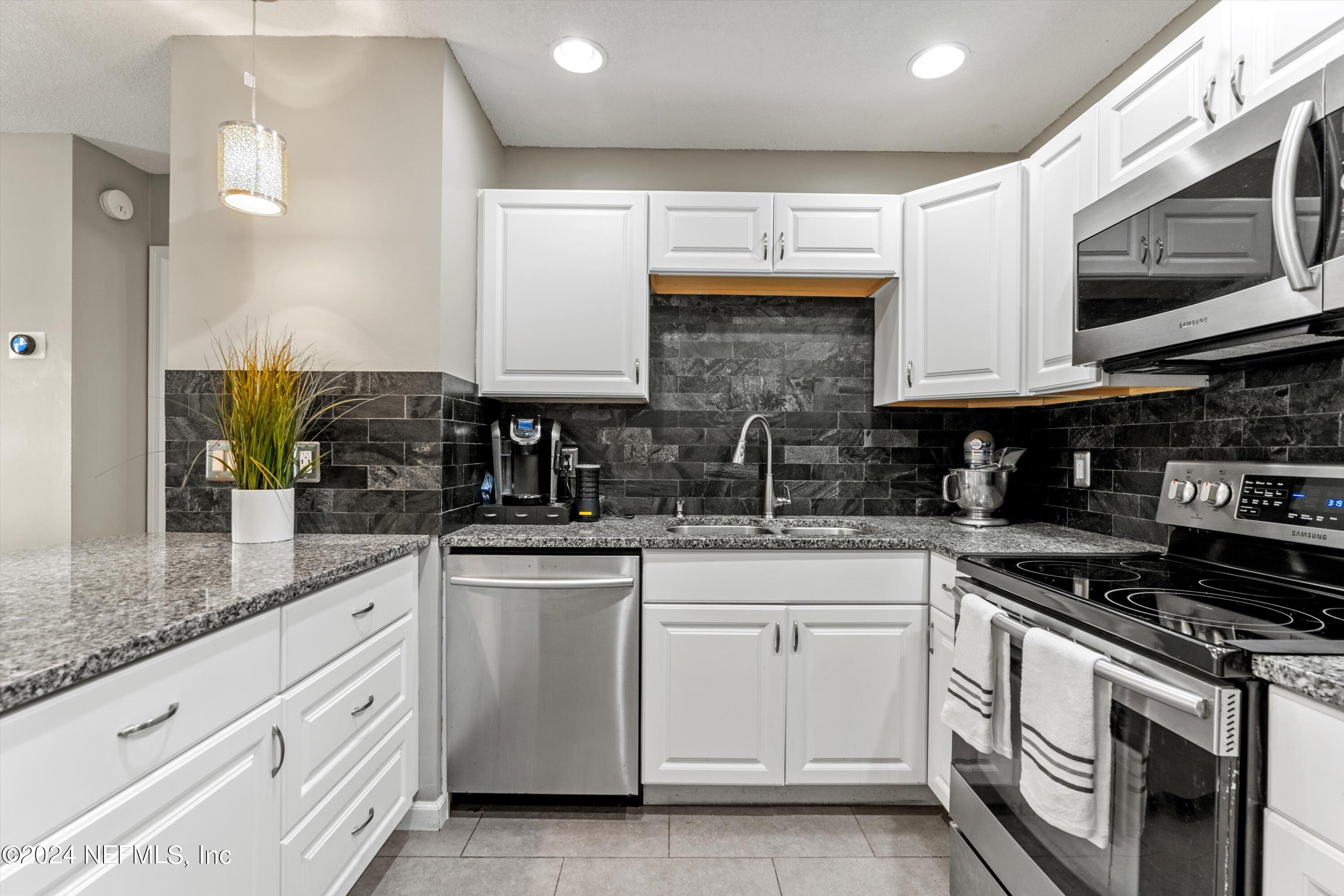 8837 Ivey Road Jacksonville, FL 32216 - Photo 11 of 22 08-Kitchen 2