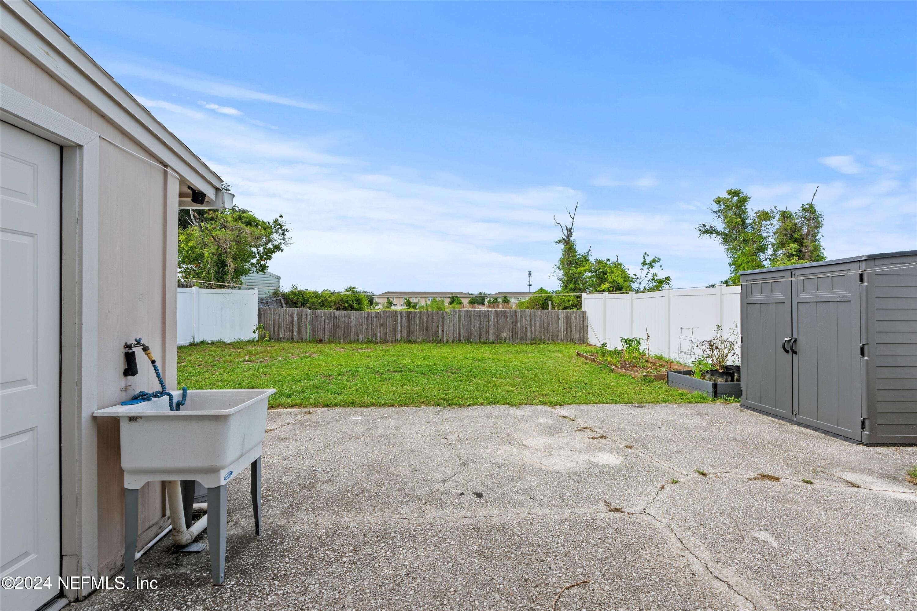 8837 Ivey Road Jacksonville, FL 32216 - Photo 20 of 22 22-Back Yard 1