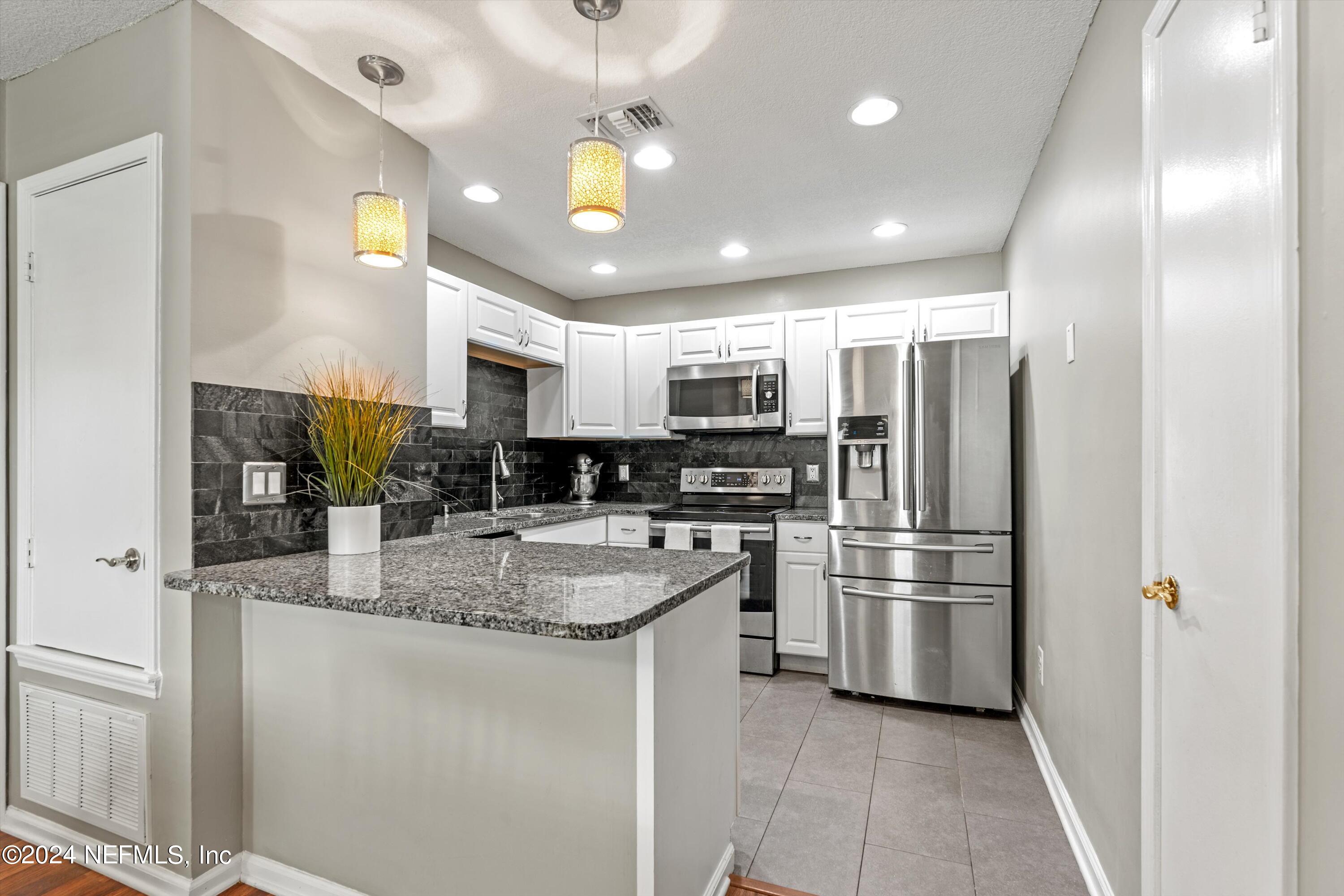 8837 Ivey Road Jacksonville, FL 32216 - Photo 10 of 22 07-Kitchen 1