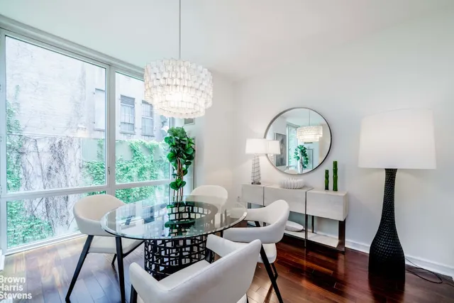 a kitchen with stainless steel appliances granite countertop a stove sink and cabinets