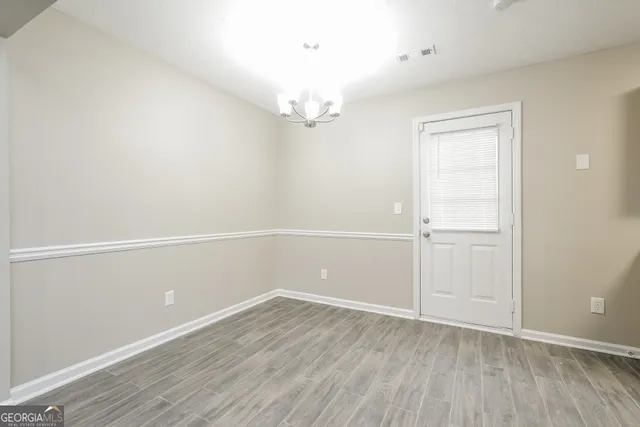 a kitchen with a sink stove and refrigerator