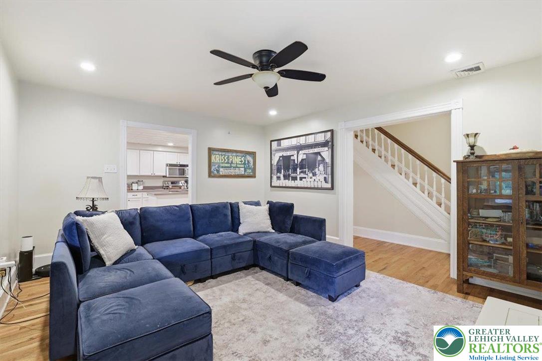 3585 Fairyland Road Lehighton, PA 18235 - Photo 19 of 57 a living room with furniture and a ceiling fan