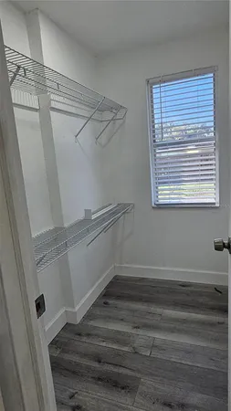 a view of a room with racks on the wall