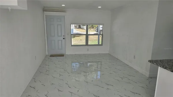 an empty room with windows