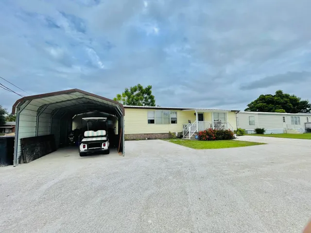 a car parked in front of a house