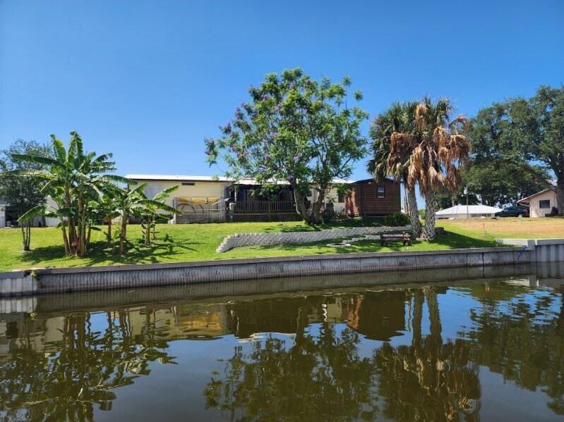 2301 Southeast 33rd Street Okeechobee, FL 34974 - Photo 28 of 31 a view of swimming pool with a yard