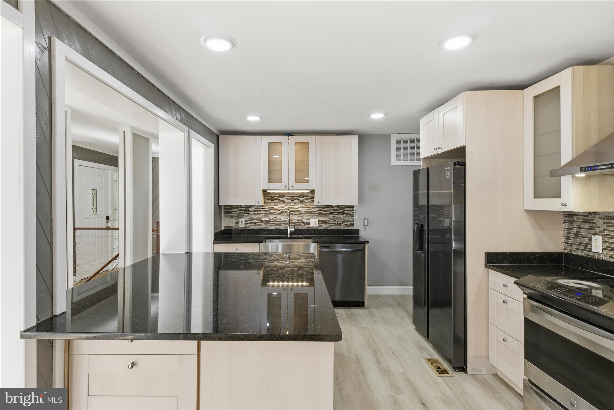 5515 Westcliff Court Burke, VA 22015 - Photo 13 of 47 a kitchen with refrigerator a stove and a sink