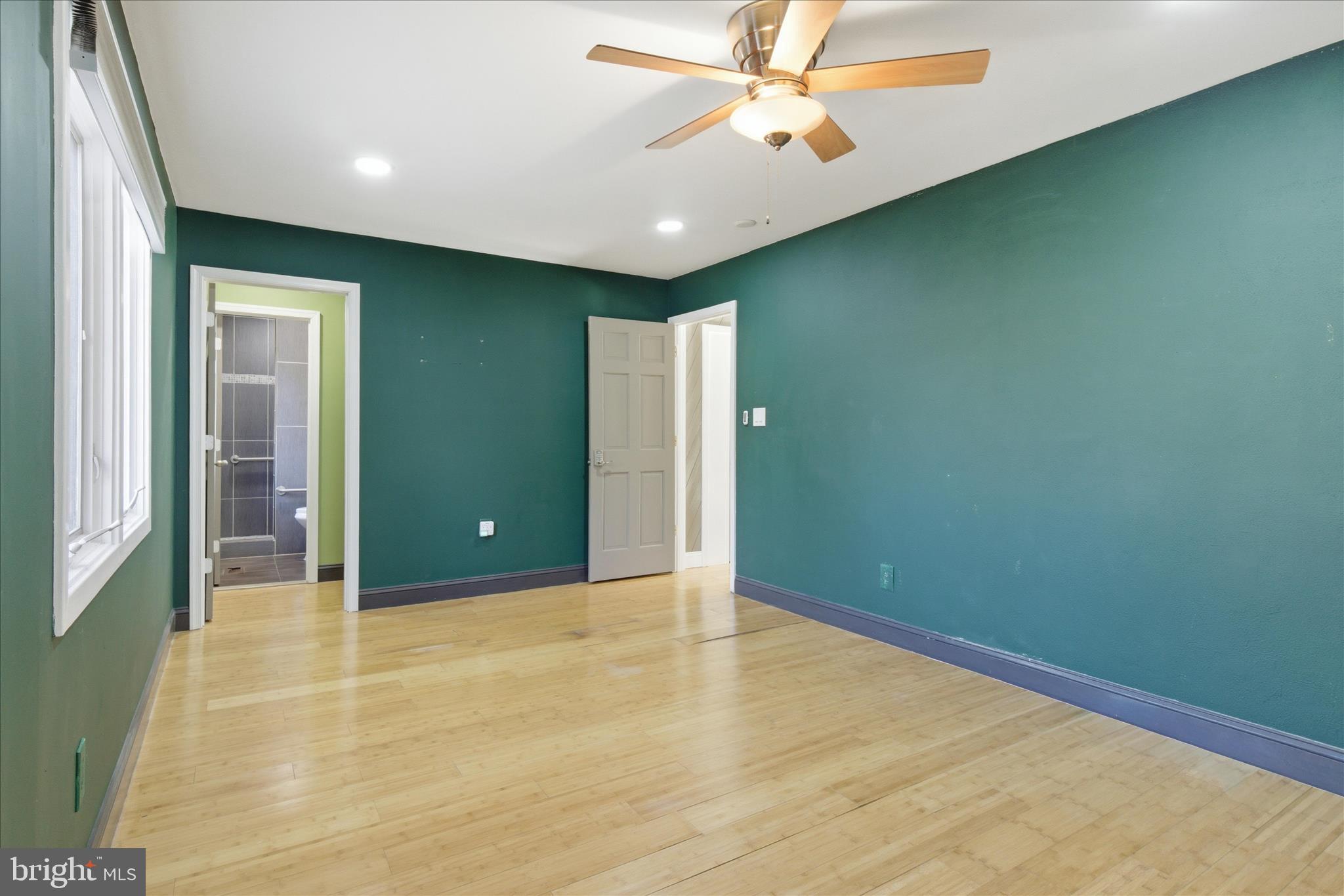 5515 Westcliff Court Burke, VA 22015 - Photo 19 of 47 an empty room with closet and a chandelier fan