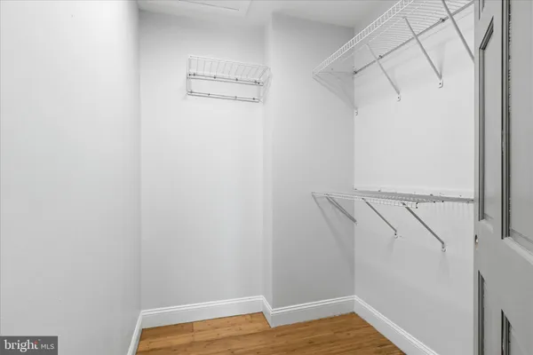 a view of a room with racks on the wall