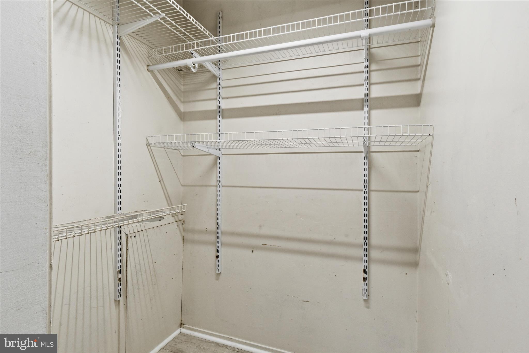 5515 Westcliff Court Burke, VA 22015 - Photo 36 of 47 a view of a room with racks on the wall
