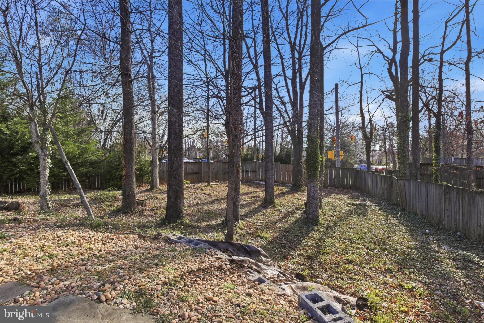 5515 Westcliff Court Burke, VA 22015 - Photo 42 of 47 a backyard of a house with lots of green space