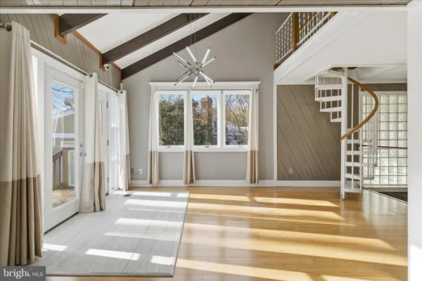 a view of a brick house with a large windows
