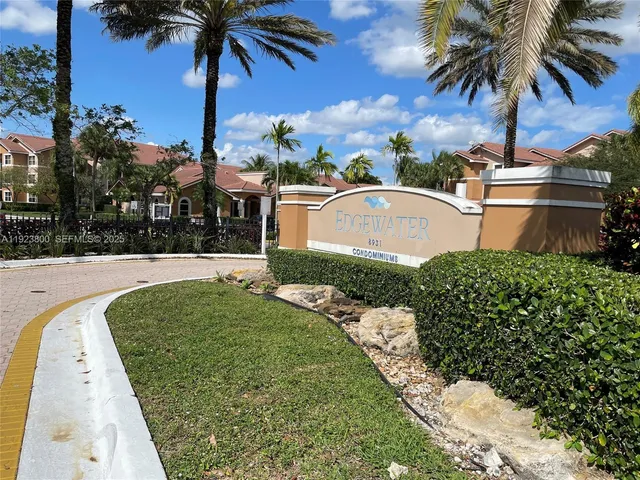a view of swimming pool with a yard