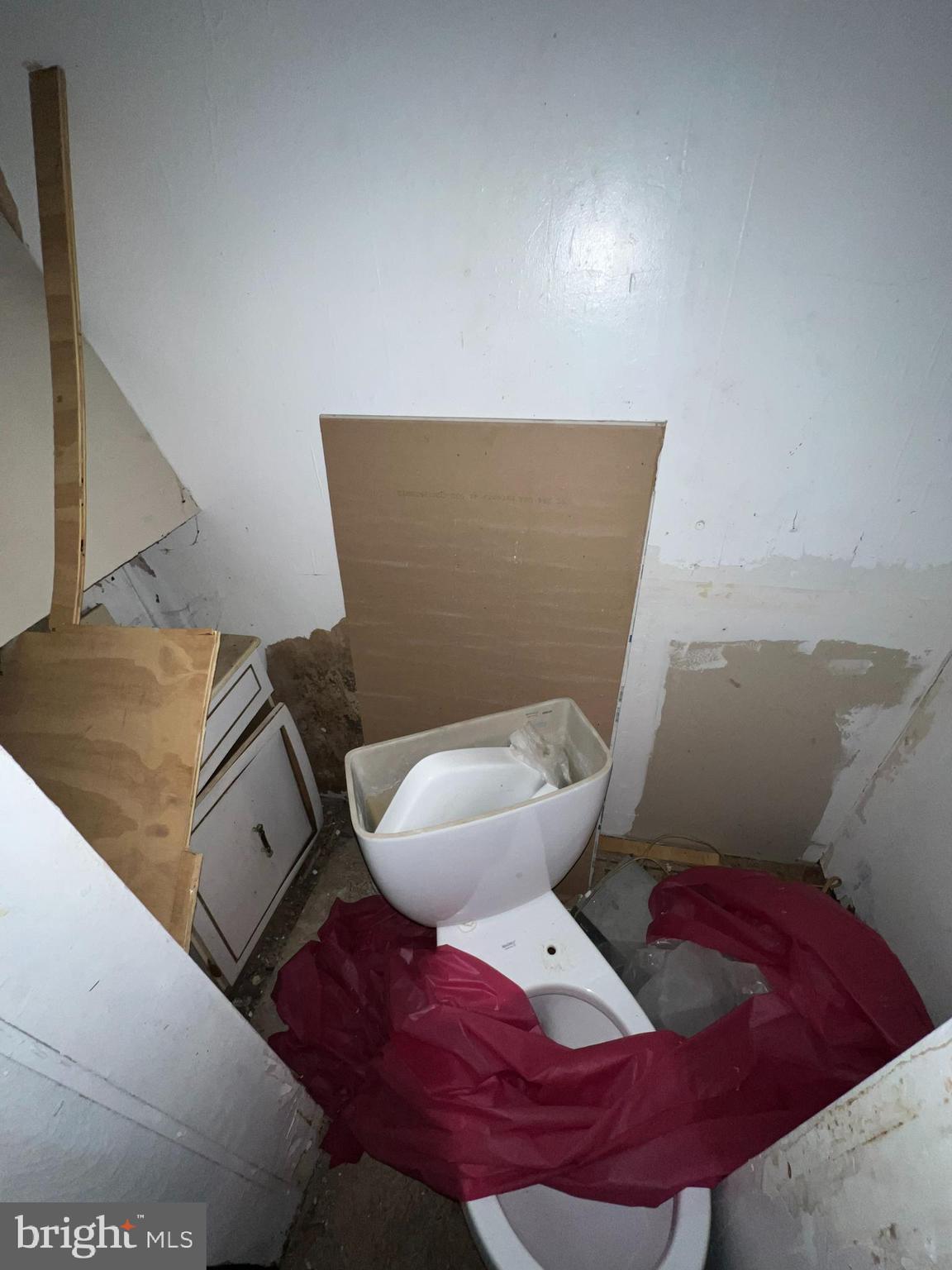 5502 Master Street Philadelphia, PA 19131 - Photo 20 of 49 a bathroom with a toilet and a mirror