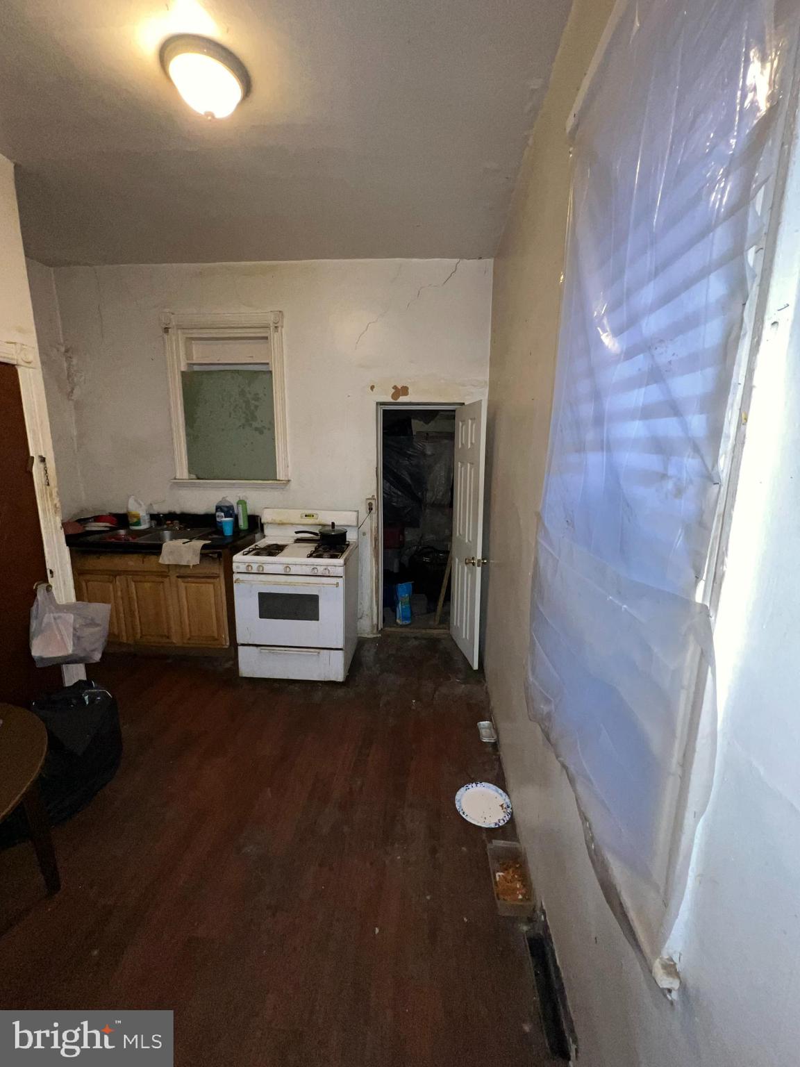 5502 Master Street Philadelphia, PA 19131 - Photo 21 of 49 a kitchen with a refrigerator and a stove