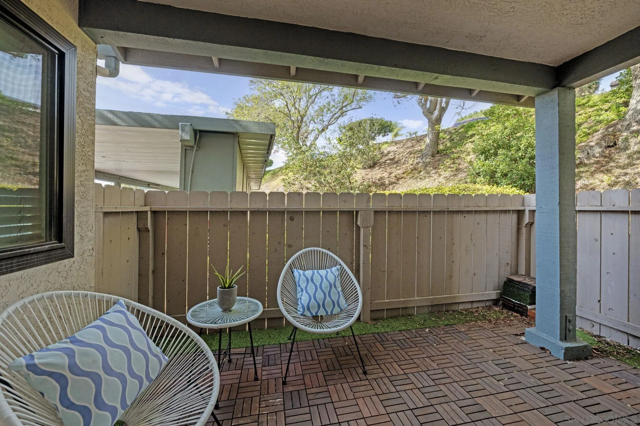3002 Blue Oak Court Spring Valley, CA 91978 - Photo 19 of 23 a backyard of a house with table and chairs