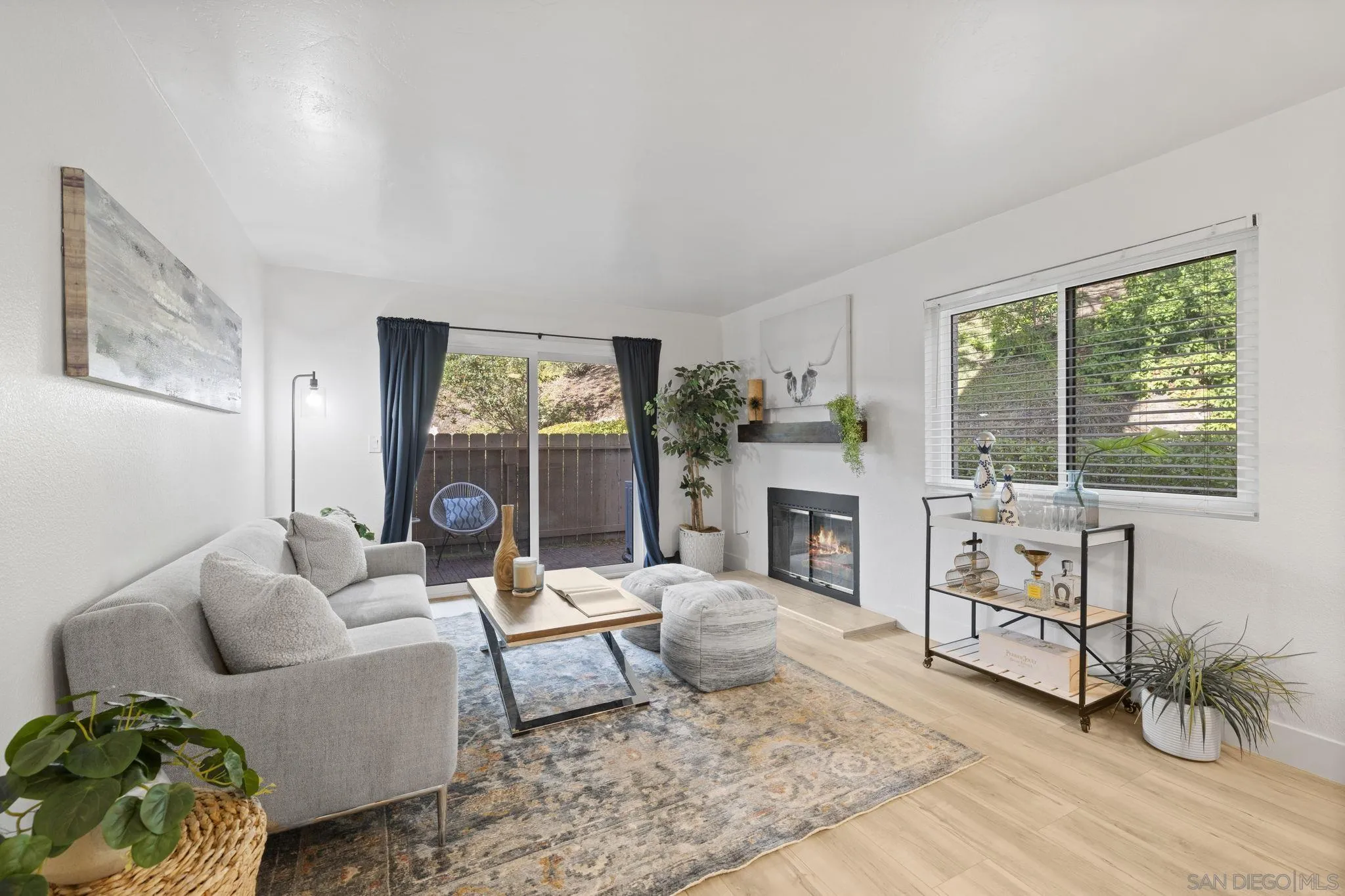 3002 Blue Oak Court Spring Valley, CA 91978 - Photo 4 of 23 a living room with furniture and a fireplace