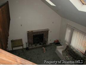 3174 Avoy Road Lake Ariel, PA 18436 - Photo 4 of 4 a living room with a fireplace