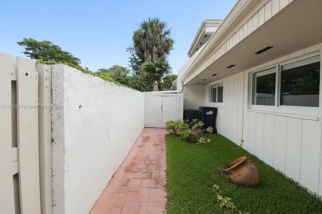 a backyard of a house with seating space