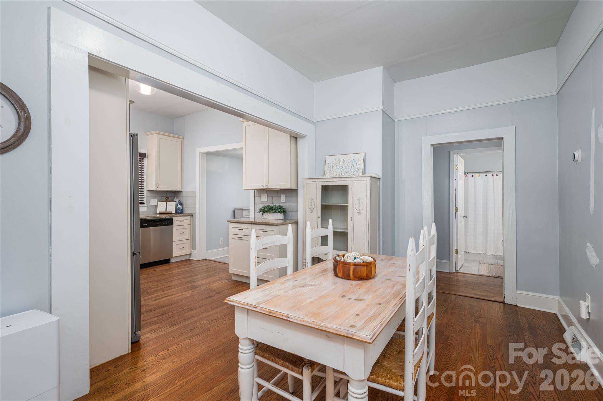 58 Fourth Street Cramerton, NC 28032 - Photo 21 of 44 a open kitchen with a table and chairs