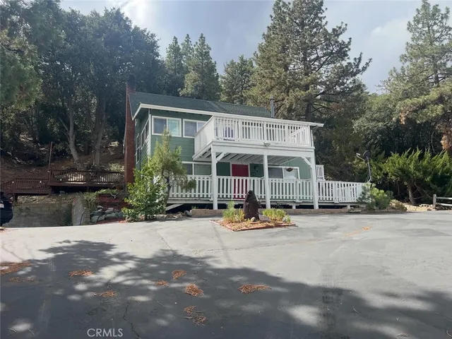 a view of a hall with wooden floor
