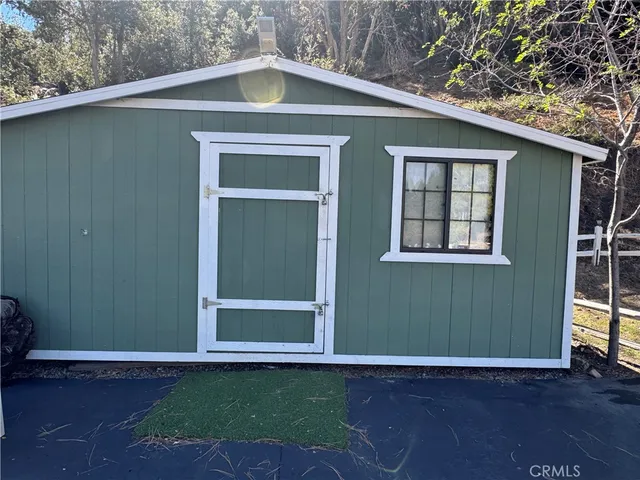 a view of empty room with fireplace
