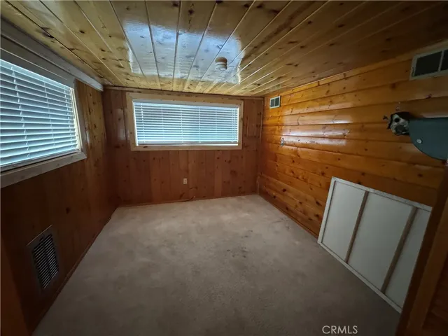 a bathroom with a sink a toilet a tub and shower