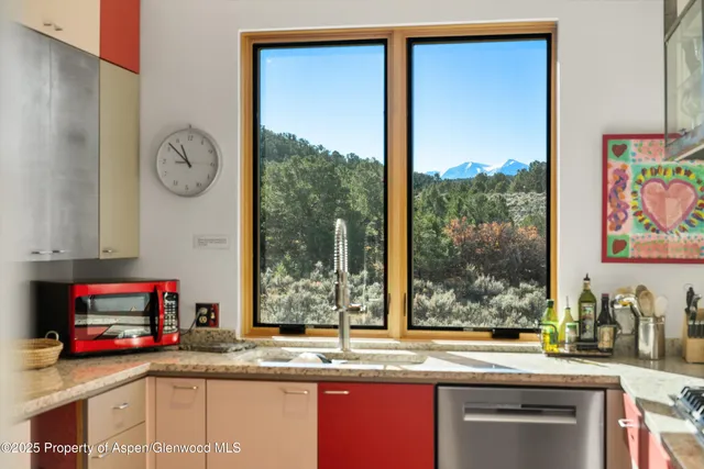 a room with furniture and a window