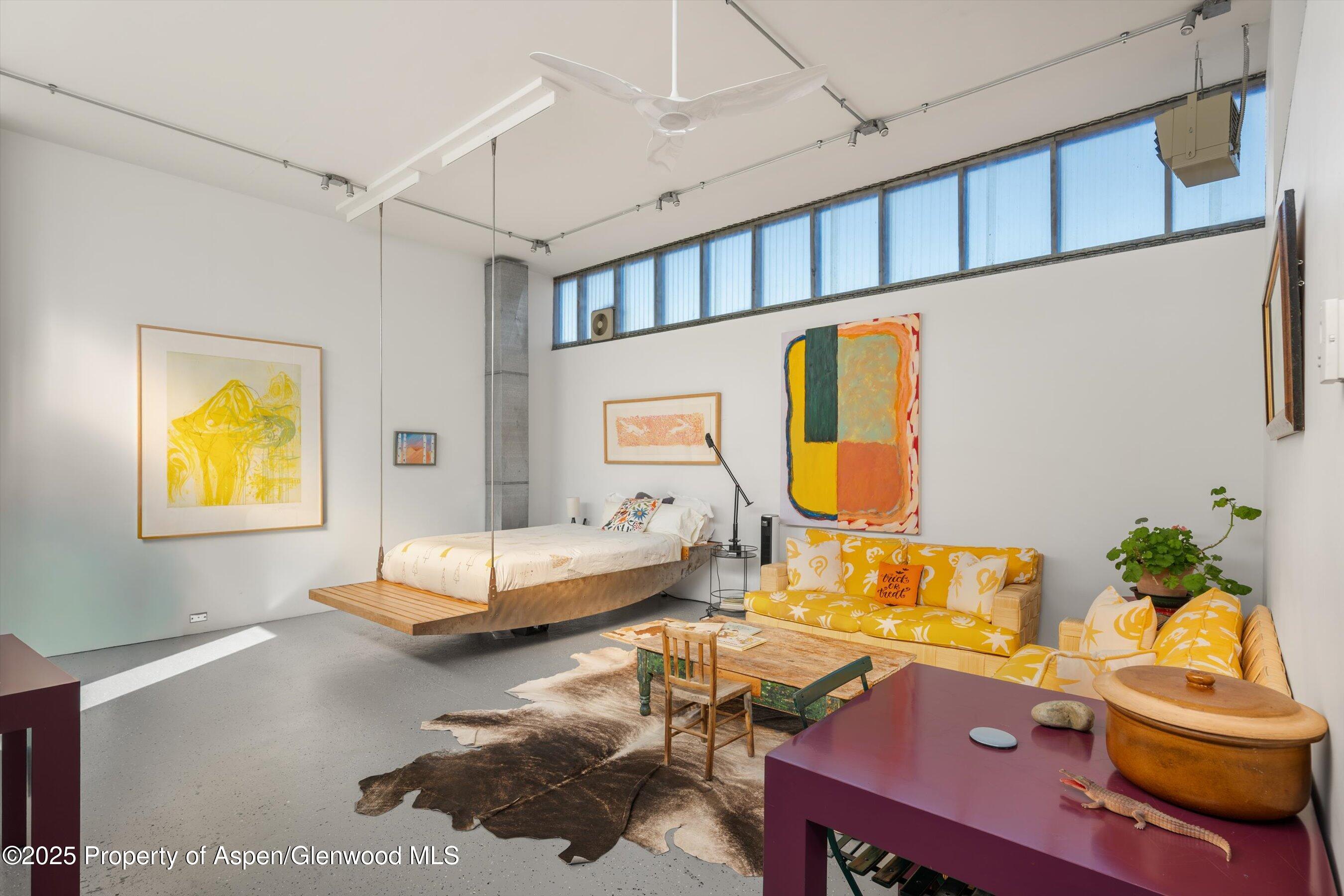525 Cactus Flats Road Carbondale, CO 81623 - Photo 28 of 50 a living room with furniture and a wooden floor