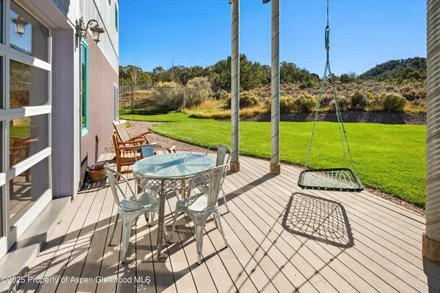 a view of swimming pool with a patio