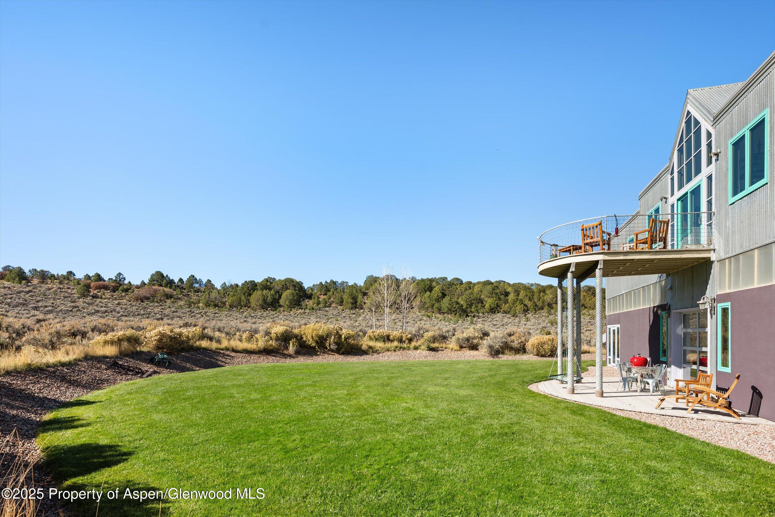 525 Cactus Flats Road Carbondale, CO 81623 - Photo 39 of 50 a view of house with outdoor space and porch