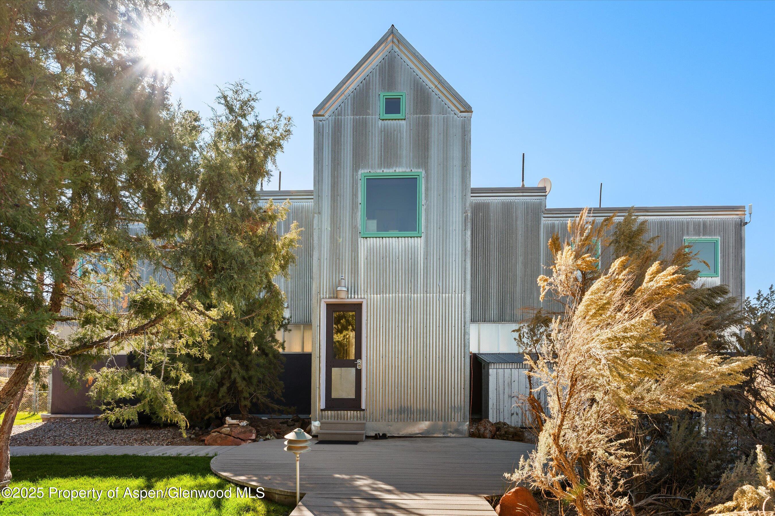 525 Cactus Flats Road Carbondale, CO 81623 - Photo 40 of 50 a front view of a house with a yard