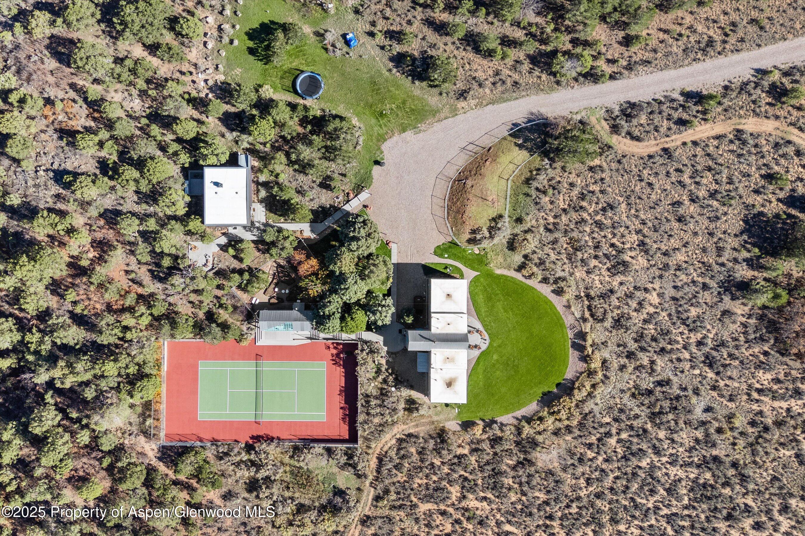 525 Cactus Flats Road Carbondale, CO 81623 - Photo 45 of 50 a view of a wooden building with a outdoor space