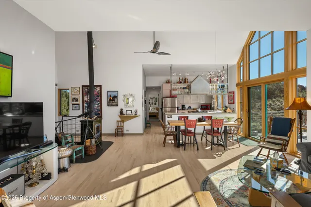 a view of a dining room with furniture kitchen and mountain view