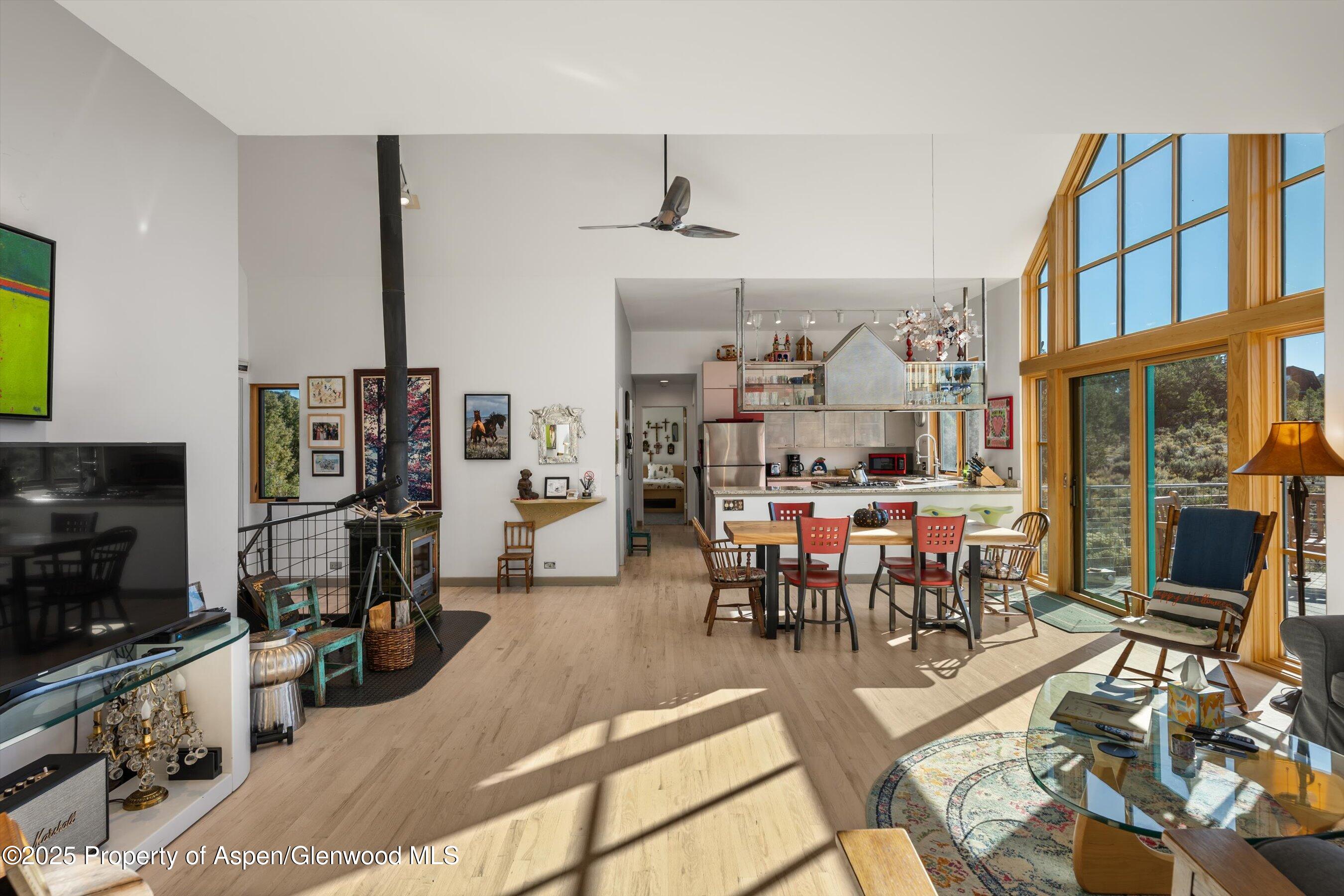 525 Cactus Flats Road Carbondale, CO 81623 - Photo 9 of 50 a view of a dining room with furniture kitchen and mountain view