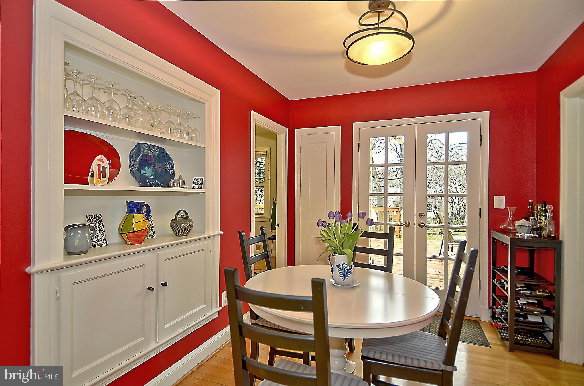 9508 Evergreen Street Silver Spring, MD 20901 - Photo 10 of 30 Features built ins & French doors leading to deck.