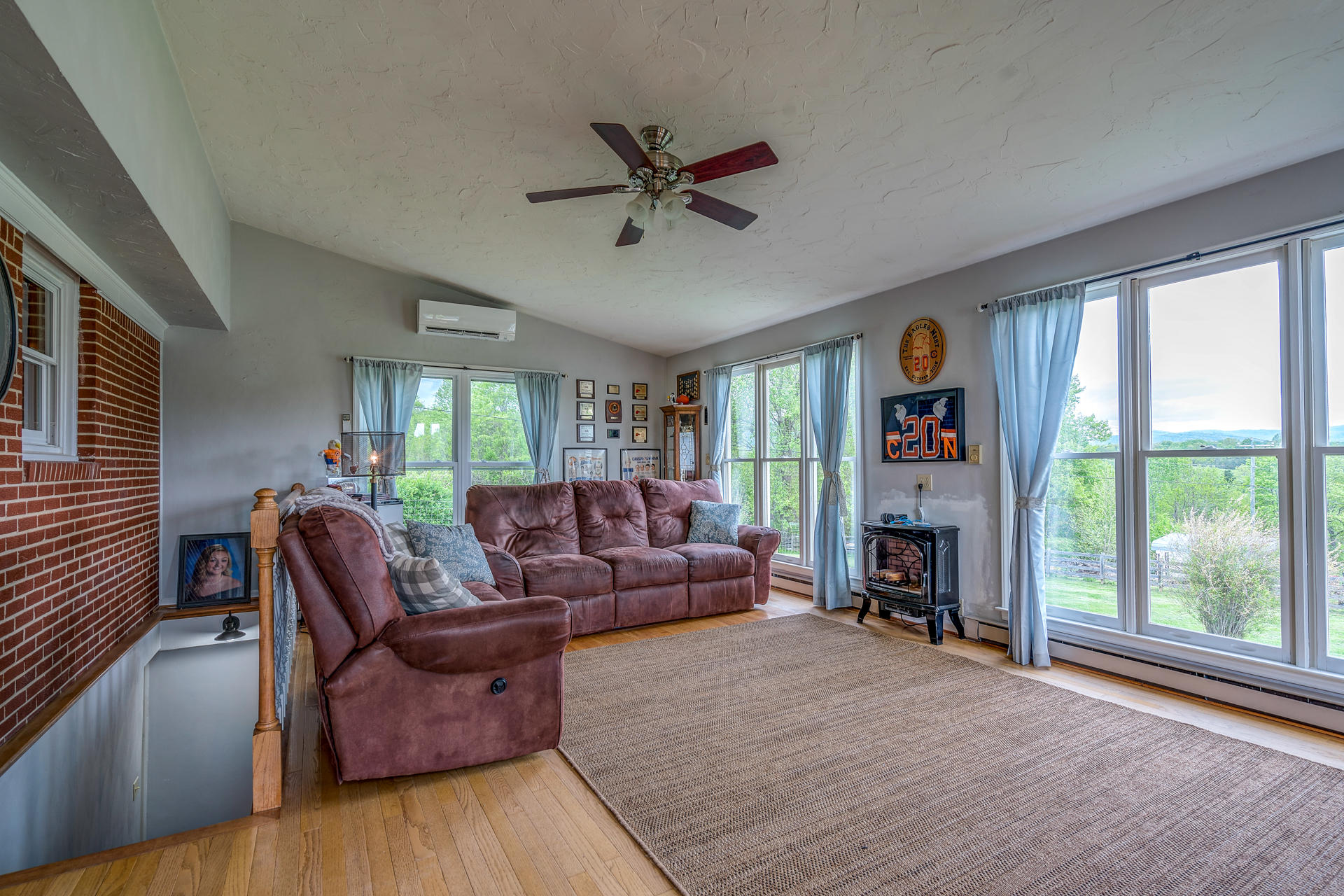 1672 Blankenship Road Goodview, VA 24095 - Photo 14 of 39 a living room with furniture and a fireplace