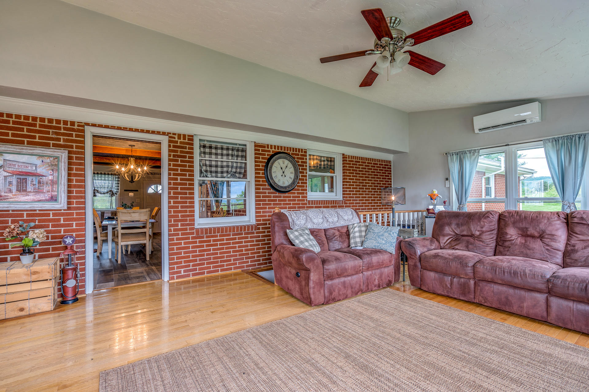 1672 Blankenship Road Goodview, VA 24095 - Photo 16 of 39 a living room with furniture and a large window